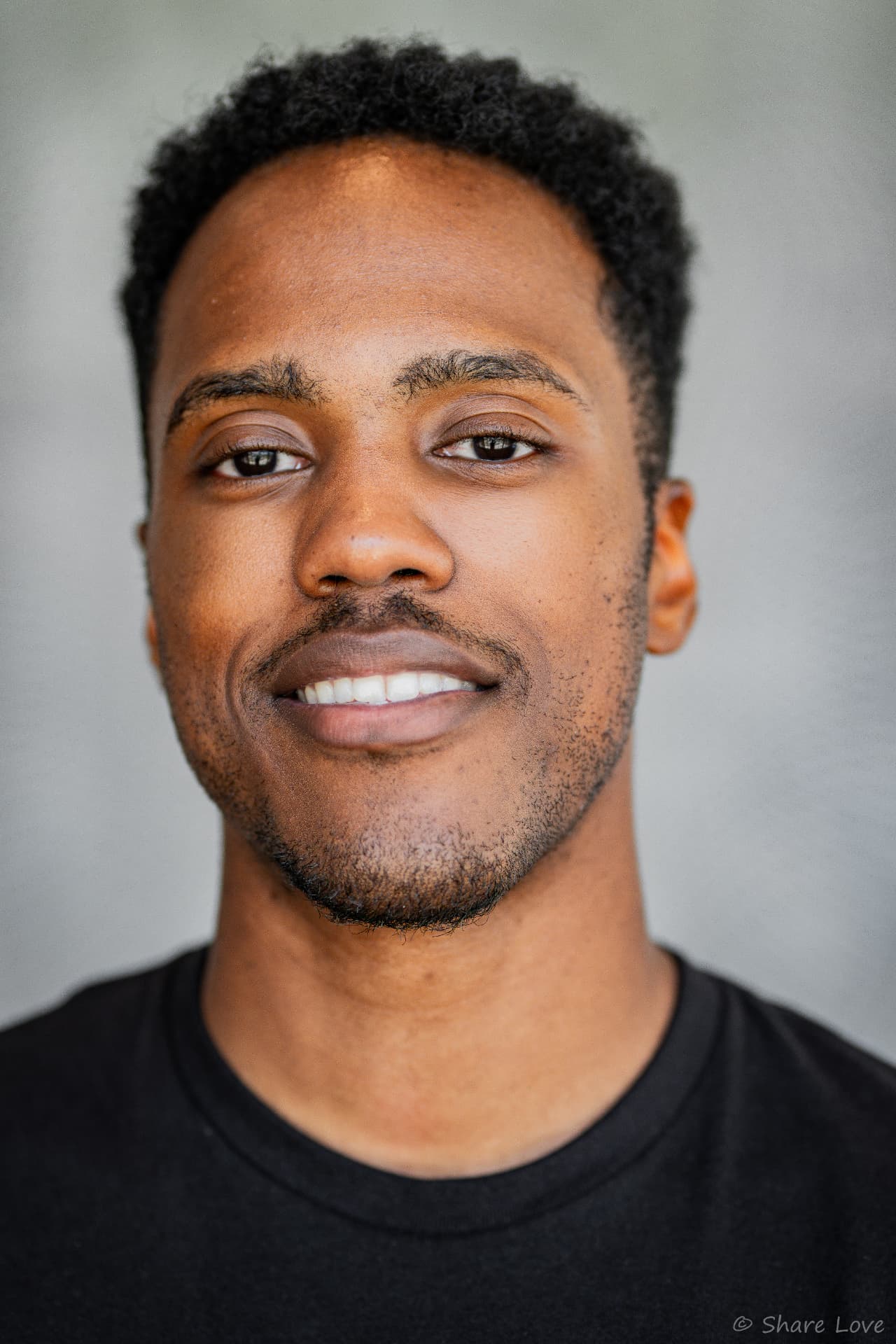 Theatrical headshot of Tash Jordan